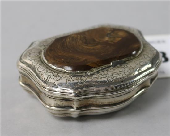 A Georgian engraved white metal and agate snuff box